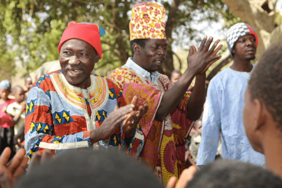 A group of men clapping their hands