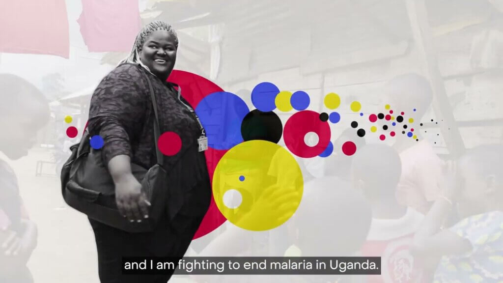 A woman with braided hair, wearing a black outfit and carrying a black bag, smiles while standing outside with several children nearby. The background features colorful, overlapping circles and the text at the bottom reads, "and I am fighting to end malaria in Uganda.