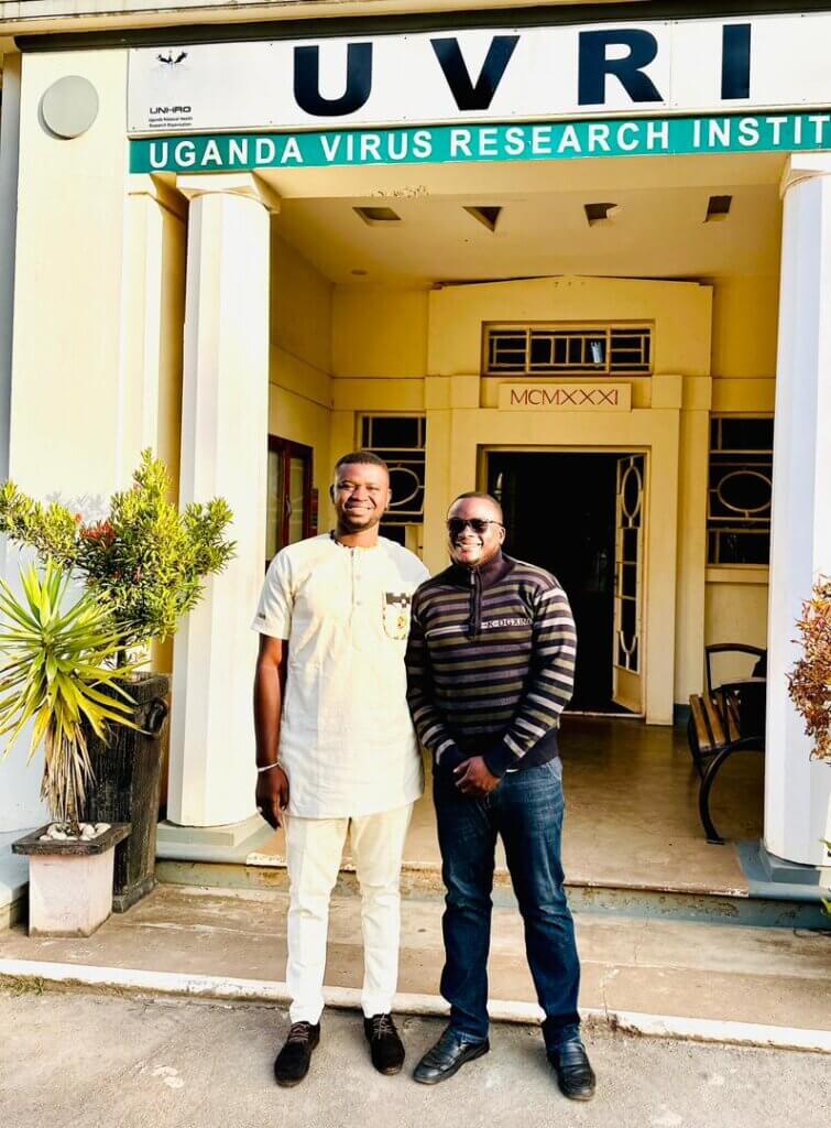 Latif Ouedraogo and Chris Tenderi Maiso standing outside UVRI.