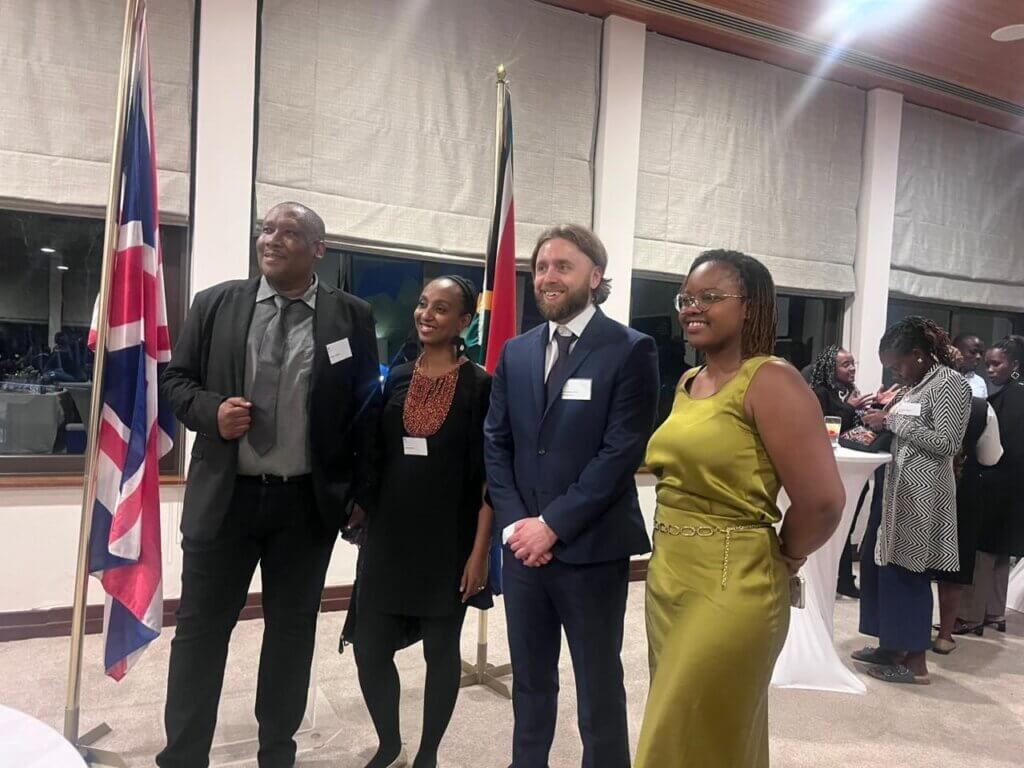 From right to left: Stephen Johns (Imperial College London) and Ndeye Mane Sall (Target Malaria) and two journalists at a reception at the British High Commission in South Africa to celebrate UK-Africa journalist and scientific collaboration