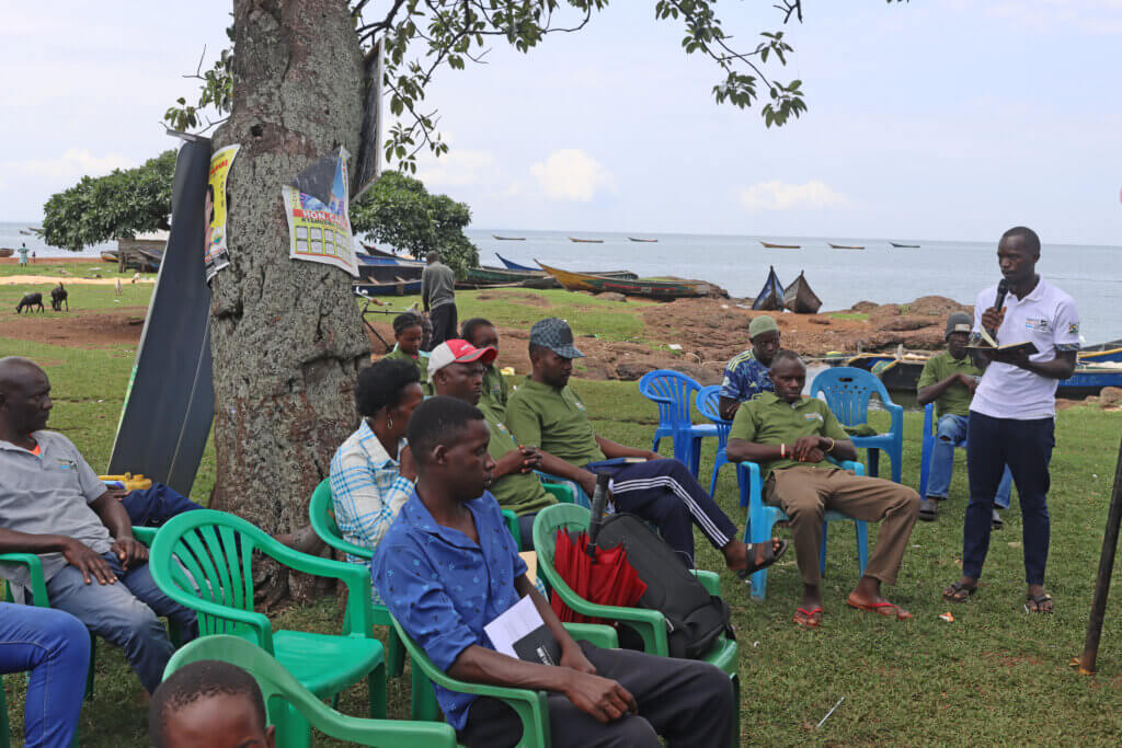 Farooq Ssebugwawo addressing a community gathering at the shores of Lwazi Jaana on the project work.